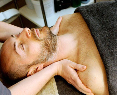 man receiving massage in Tucson day spa